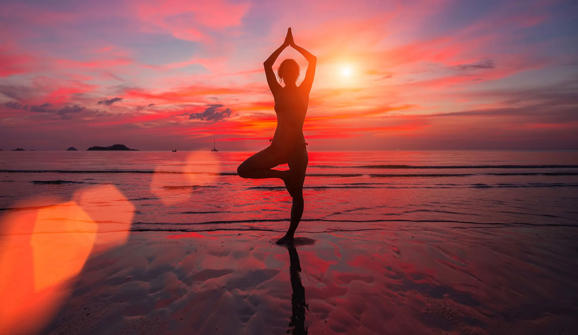 Yoga sulla spiaggia