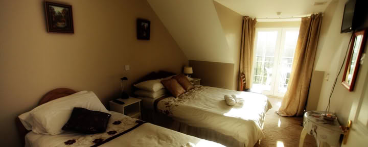 Camere triple con bagno privato
